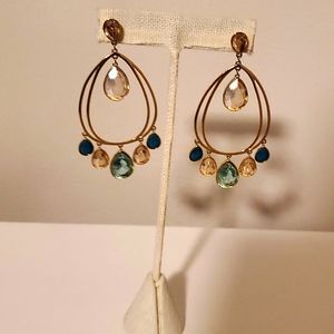 Swarovski gold earrings.